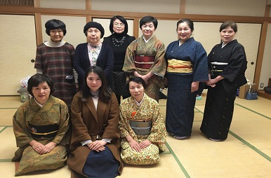 A group of people posing for a photo Description automatically generated