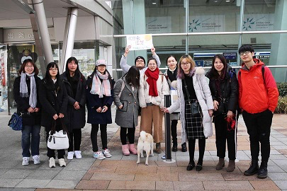 A group of people posing for a photo Description automatically generated